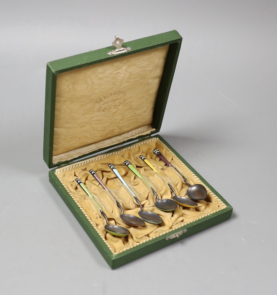 A cased set of six Norwegian sterling and polychrome enamel coffee spoons by Marius Hammer, 94mm